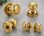 Close-up of polished solid brass Georgian door knob finish