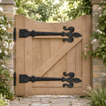 Decorative false tee hinges fitted to a timber garage door