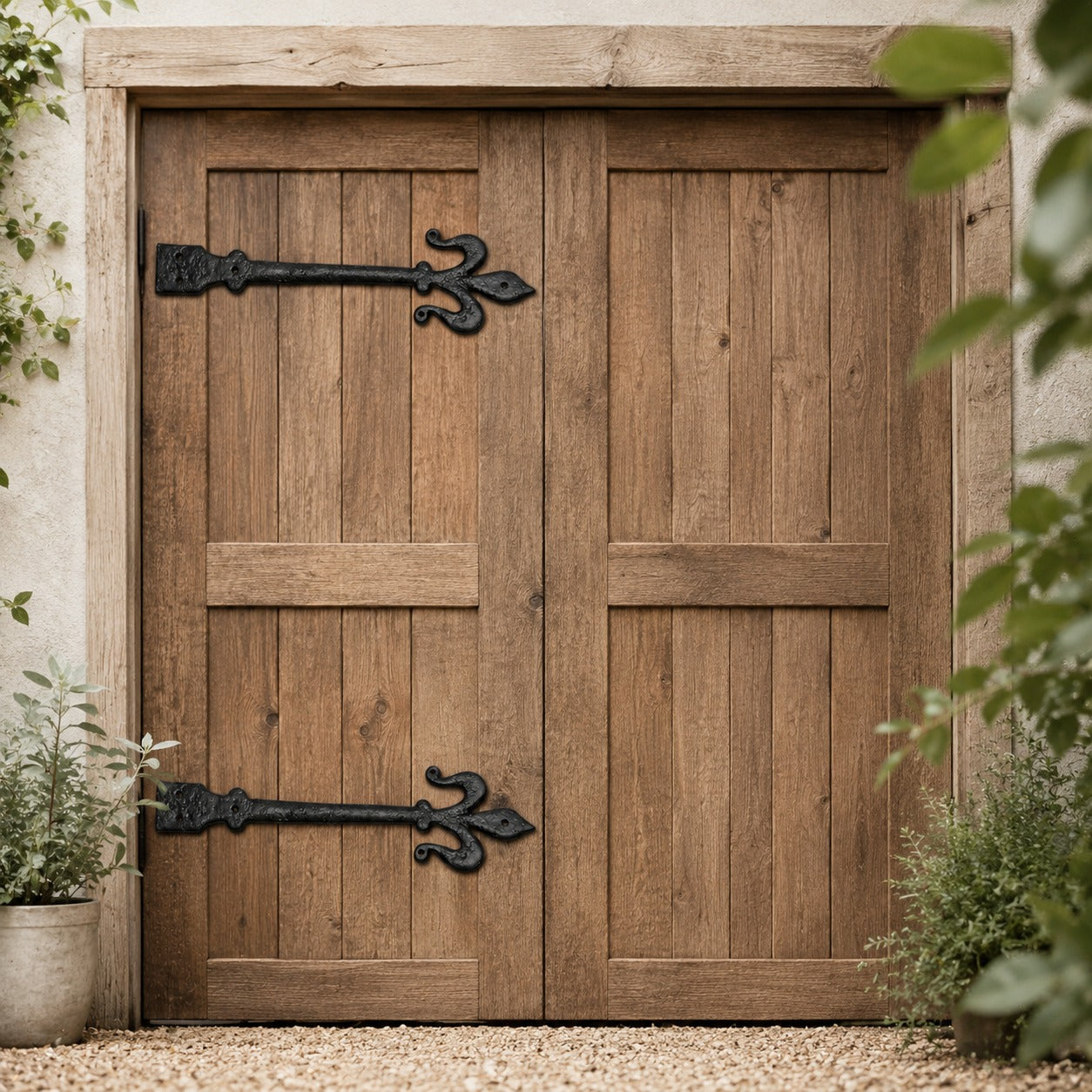 Decorative false tee hinges fitted to a timber garage door