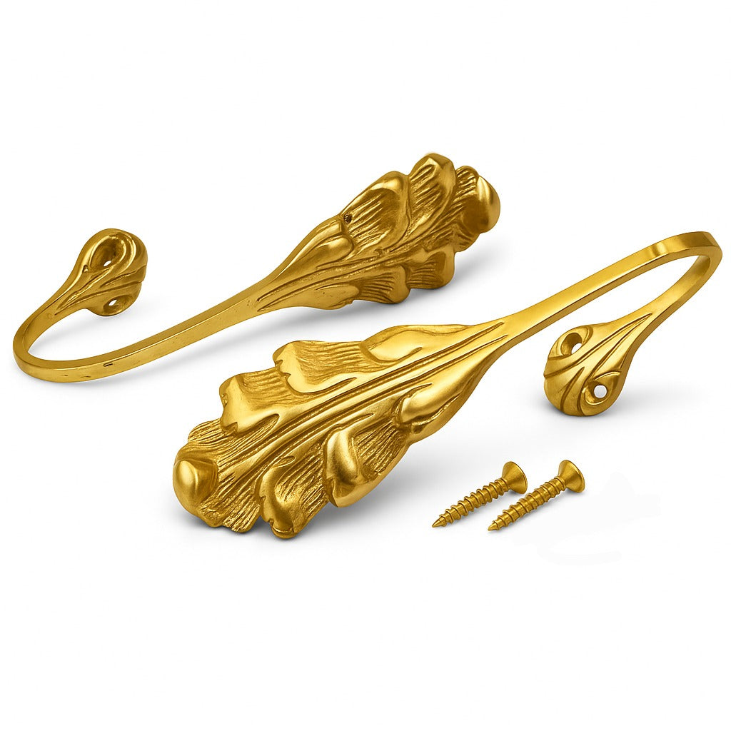 Pair of vintage solid brass curtain tie backs with feather leaf design