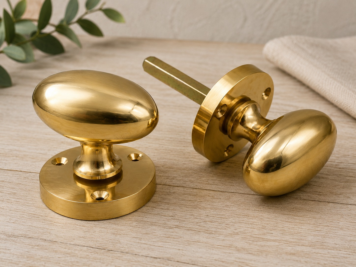 Pair of polished solid brass Victorian mortice door knobs with fixings